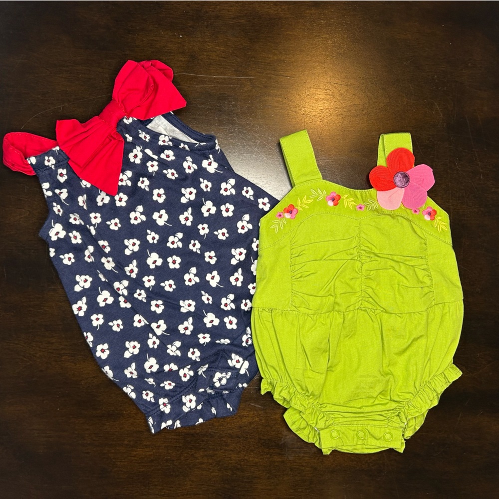 Two Gymboree premie bubble rompers